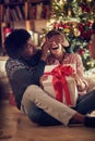 Romantic surprise for Christmas holiday Ã¢â¬âmale and female with Royalty Free Stock Photo